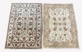 Chinese machined wool cream ground rug, decorated with interlaced foliate, (240cm x 165cm) and anoth