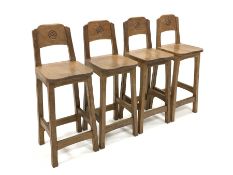 'Catman' set of four Yorkshire oak bar stools, back rest carved with Yorkshire rose roundel, shaped