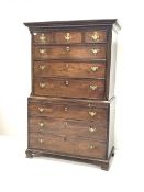 George III mahogany chest on chest, the upper section with dentil cornice and canted corners fitted