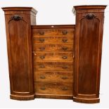 Large Victorian mahogany triple wardrobe, fitted with a bank seven graduated drawers flanked by two