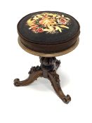 Early Victorian rosewood revolving adjustable piano stool, cushioned seat upholstered in floral need