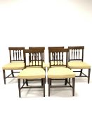 Set of six early 19th Century mahogany dining chairs, with leaf carved back rails over upholstered s