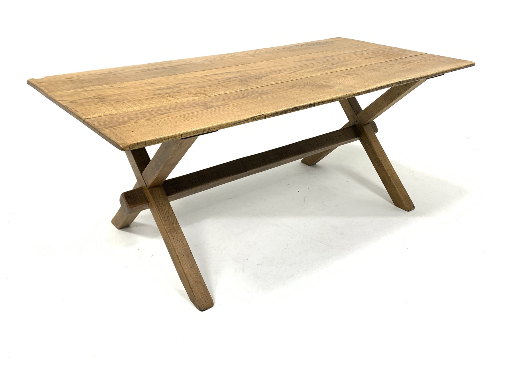 Early 20th century oak refectory style dining table, with rectangular top raised on 'X' supports uni