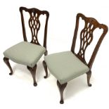 Pair early 20th century Chippendale style mahogany chairs, the shaped cresting rail relief carved wi