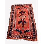 Persian Hamadan ground rug, pole medallion on red field with geometric decoration, enclosed by multi