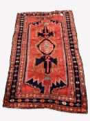 Persian Hamadan ground rug, pole medallion on red field with geometric decoration, enclosed by multi