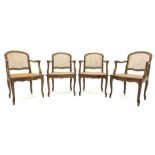 Set four French style berg�re open armchairs, beech framed with cane work seats and backs, cabriole