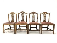 Matched set of four early 19th century oak dining chairs, pierced splats, upholstered drop in seat p