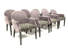 Set eight contemporary chairs, upholstered in purple floral fabric, raised on square tapered ebonise