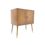 1950s walnut veneered LP cabinet with brass handles and angular legs, W61cm