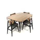 G-Plan - 'Librenza' drop leaf dining table, with gateleg action and ebonised supports, (106cm x 134c