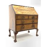 Antique design mahogany bureau, fall front revealing fitted interior over two short and two long dra
