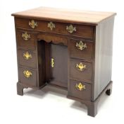 Georgian mahogany knee hole desk, rectangular moulded top, long drawer above frieze drawer, six smal