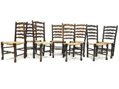 Harlequin set of eight 19th century oak ladder back chairs, with rush seats and turned supports, W49