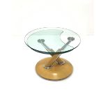 Mid 20th century glass top metamorphic coffee table, raised on chrome supports and a dished plywood