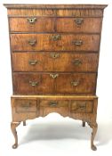 18th century and later walnut chest on stand, projecting moulded cornice over two short and three lo