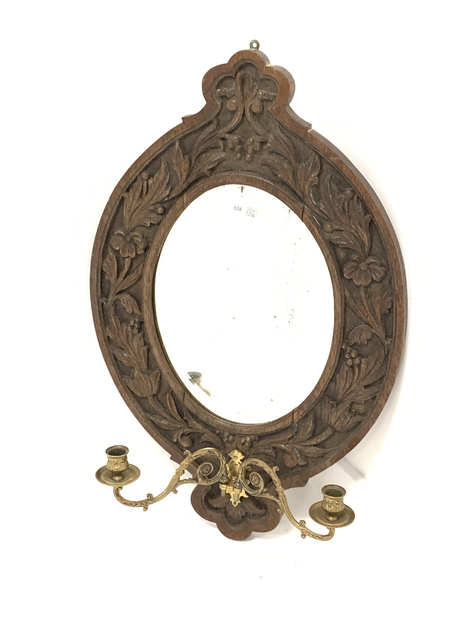 20th century oak framed wall mirror, with floral carved frame enclosing bevelled plate, and two bras - Image 2 of 3