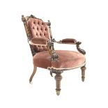 Victorian mahogany open armchair, floral carved cresting rail over deep buttoned upholstered back, p