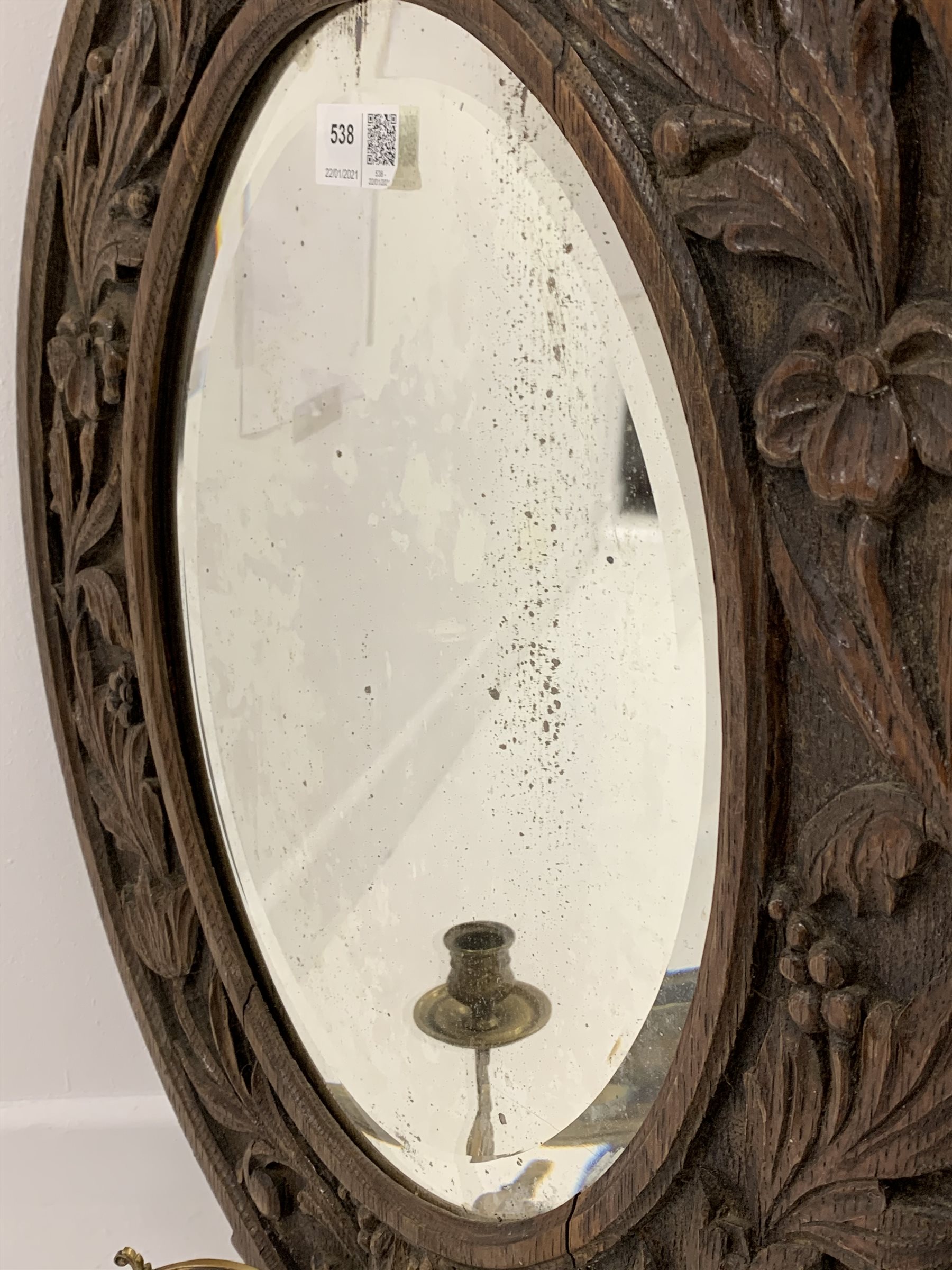 20th century oak framed wall mirror, with floral carved frame enclosing bevelled plate, and two bras - Image 3 of 3