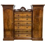 Victorian mahogany combination wardrobe, with a central bank of six drawers flanked by two full leng