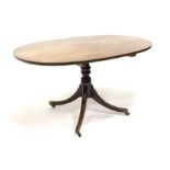 Georgian mahogany breakfast table, oval tilt top on turned pedestal base, four out splayed supports