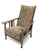 Early 20th century Arts and Crafts oak reclining armchair, with upholstered seat and back, raised on