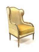 19th century giltwood wing back armchair with leaf and bead carved decoration on fluted turned suppo