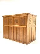 'Catman' pitch pine bar, adzed top over panelled front carved with floral roundels, open shelf, slid