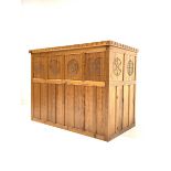 'Catman' pitch pine bar, adzed top over panelled front carved with floral roundels, open shelf, slid