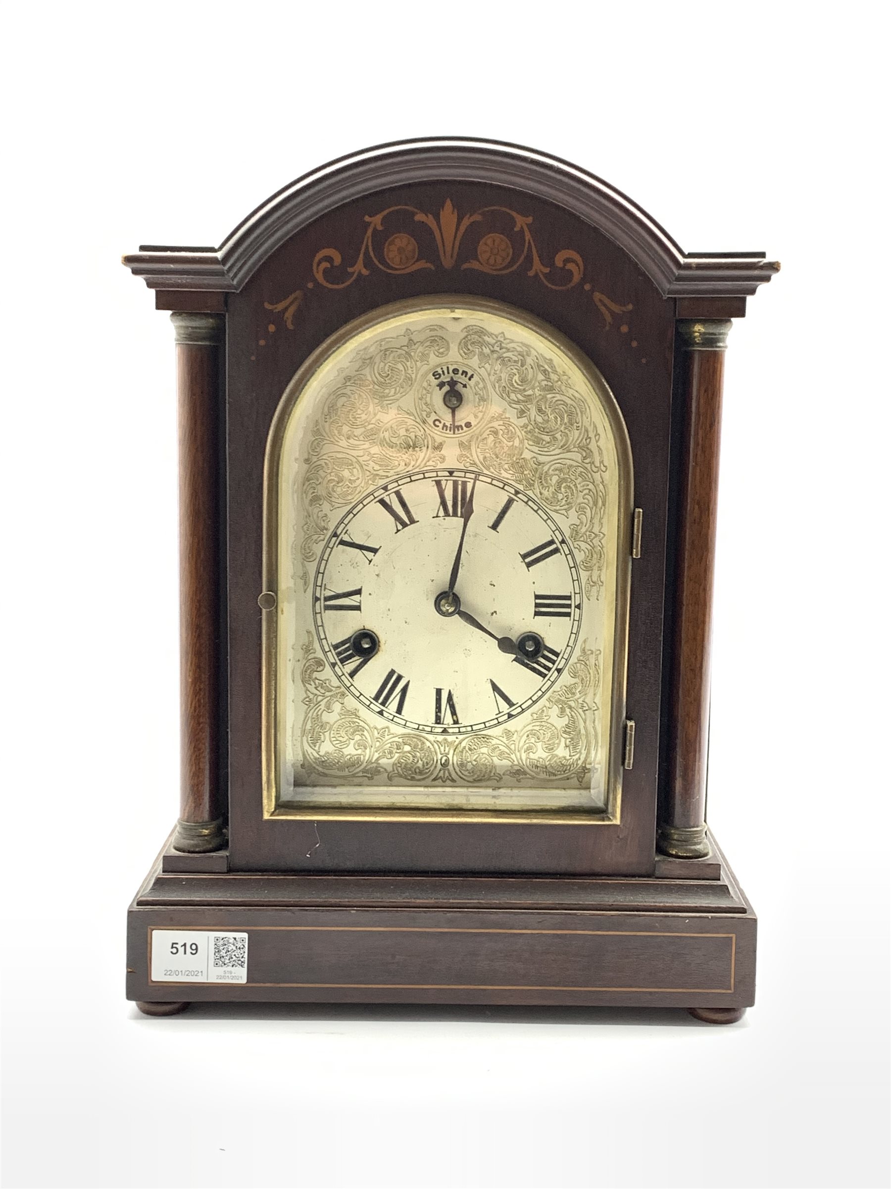 20th century dome top mantel clock, the case with floral and string inlay, silvered dial with Roman