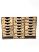 Late 19th early 20th century pine engineer or machinist draws fitted with 22 draws each having brass