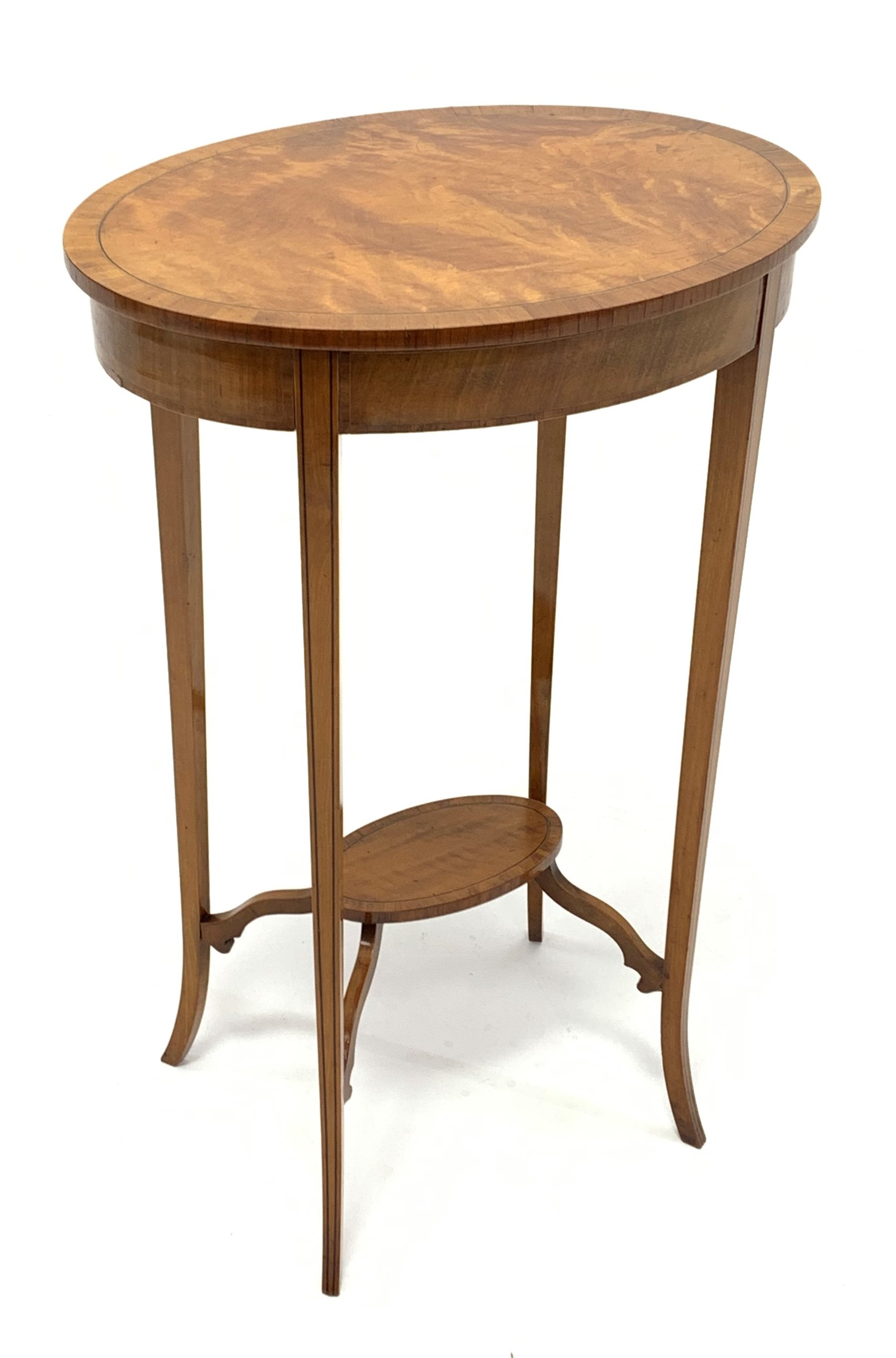 Edwardian satinwood lamp table with oval top, square tapering out splayed supports with ebony string