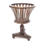 20th century mahogany circular jardiniere stand, raised on turned column and trefoil base with turne