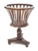 20th century mahogany circular jardiniere stand, raised on turned column and trefoil base with turne