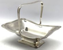Silver rectangular fruit dish with beaded and shell moulded border