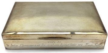 Silver rectangular cigarette box with engine turned decoration and presentation inscription 1971 W16