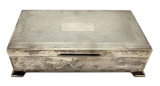 Silver rectangular cigarette box with engine turned cover and bracket feet L17cm Birmingham 1950 Mak