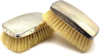 Pair of engine turned silver backed hairbrushes with inscription dated 1980