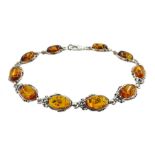 Silver oval Baltic amber link bracelet