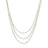 Long 16ct gold chain set with twenty light grey pearls