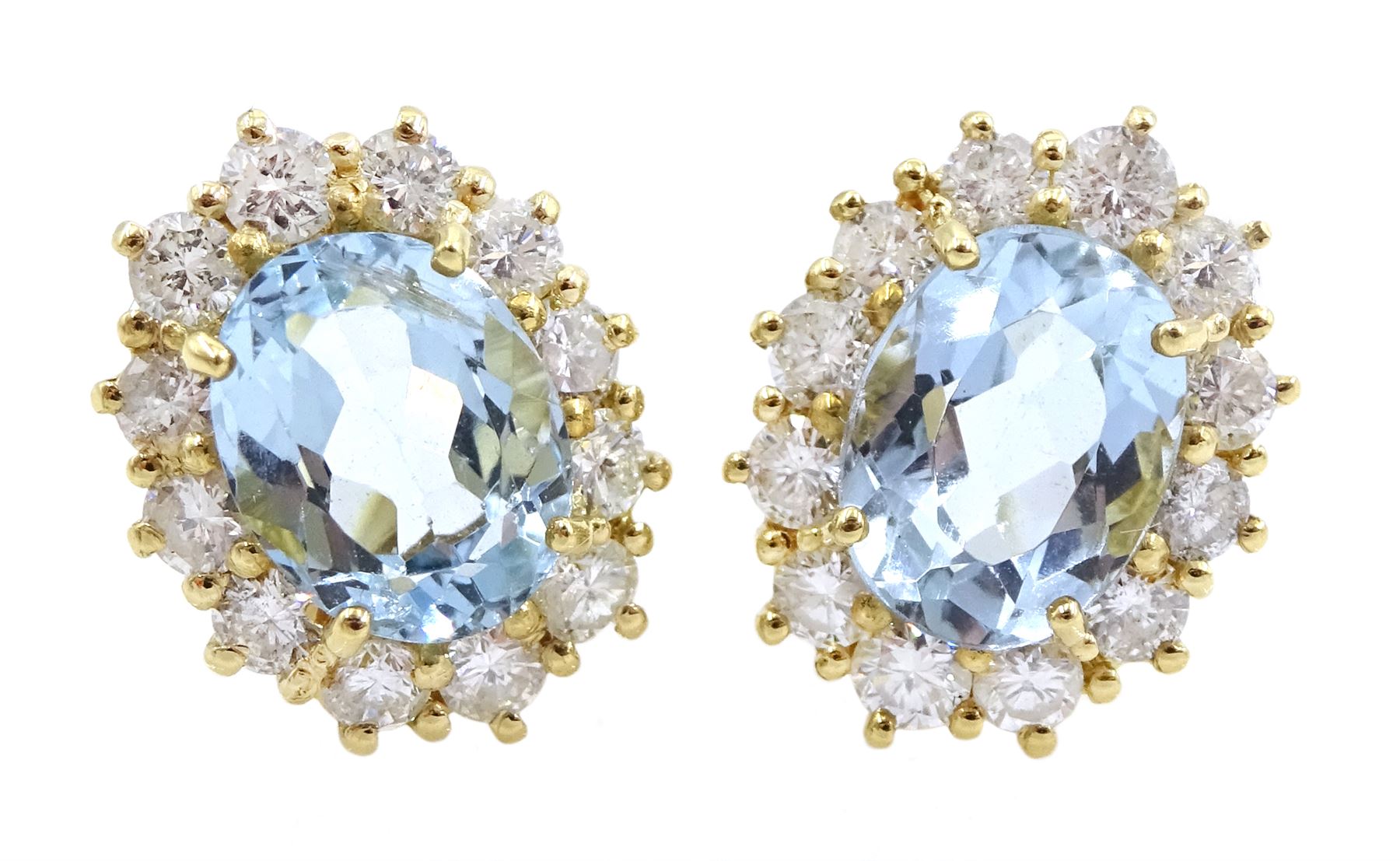 Pair of 18ct gold aquamarine and diamond cluster stud earrings