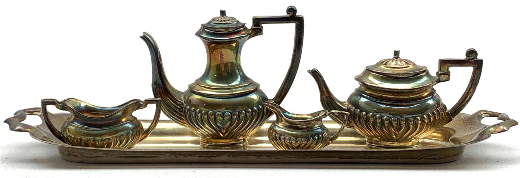 Miniature silver tea and coffee set comprising tea pot