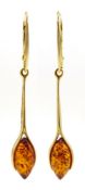 Pair of silver-gilt marquise shaped amber pendant earrings