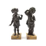 Pair of bronze figures of children, each as a standing figure holding a wheatsheaf, and the other ho