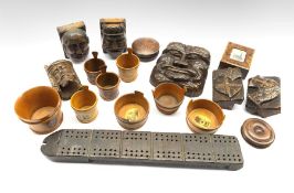 Mauchline ware butter tubs and salt cellars decorated with views and portraits including Robert Burn