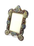 19th century French Champleve enamel mirror of serpentine outline with foliate scroll decoration, 3