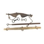 19th century bull leading pole, vintage oak yoke, two wrought iron bull nose rings, together with a