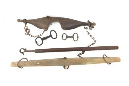 19th century bull leading pole, vintage oak yoke, two wrought iron bull nose rings, together with a