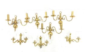 Set of three modern brass two branch wall lights with glass shades, height of backplate 20cm, and a