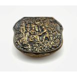 19th century gilt metal box of serpentine outline, the hinged cover embossed with figures, W7cm